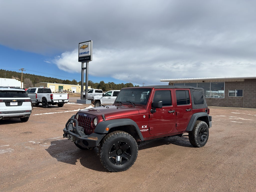 Used 2009 Jeep Wrangler Unlimited X with VIN 1J4GA39179L721222 for sale in Newcastle, WY